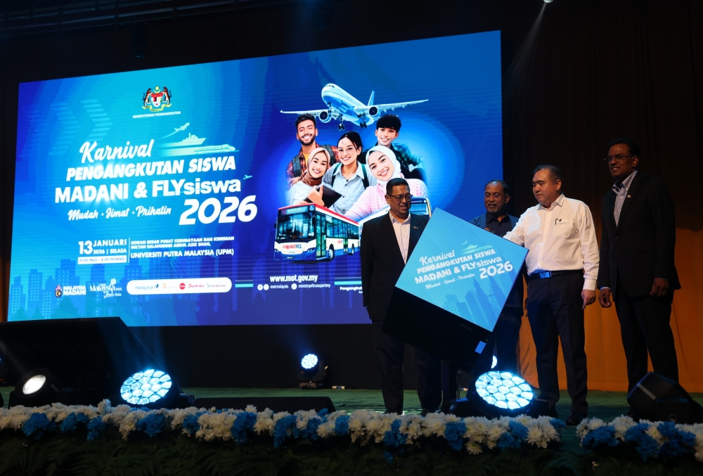 Transport Minister Anthony Loke and Higher Education Minister Datuk Seri Zambry Abd Kadir perform the opening ceremony gimmick at the launch of the Madani Student Transport Carnival & FLYsiswa 2026 at Universiti Putra Malaysia in Serdang, January 13, 2026. — Bernama pic 