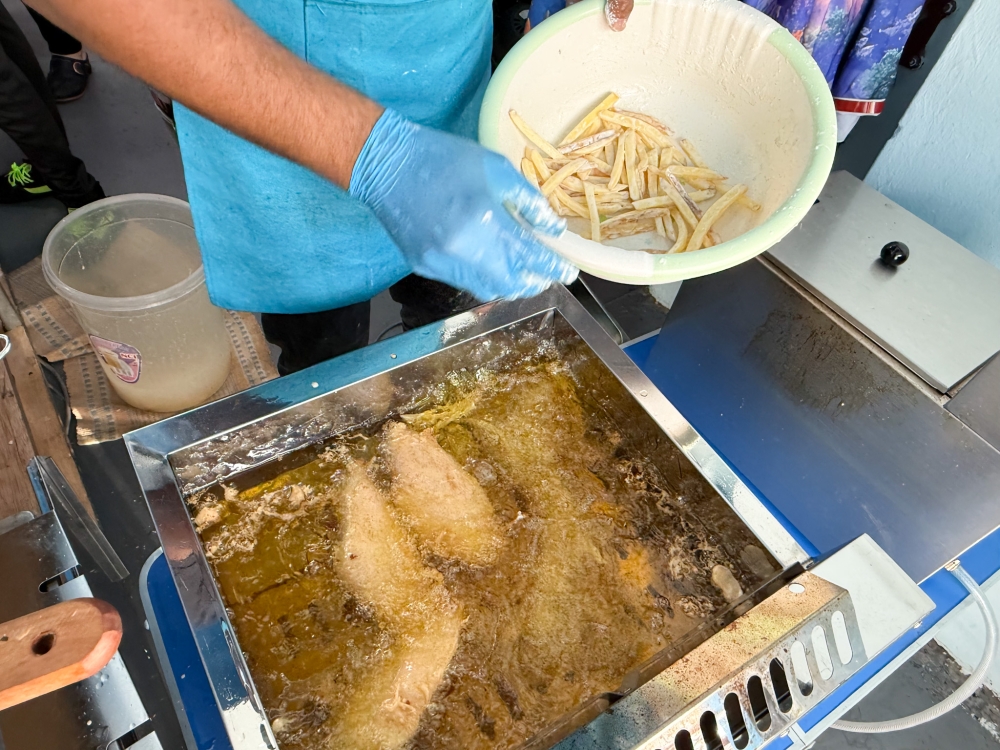 Your fish is fried upon order and the hand cut Russet potatoes are cut into thin strips and lightly coated with batter. — Picture by Lee Khang Yi