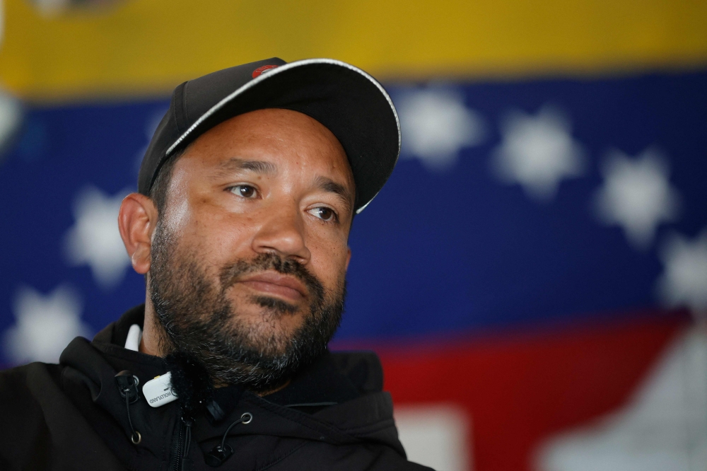 Willians, a member of ‘Boina Roja,’ a pro-government group known as ‘Colectivos,’ speaks during an interview with AFP in Caracas on January 6, 2025. — AFP pic 