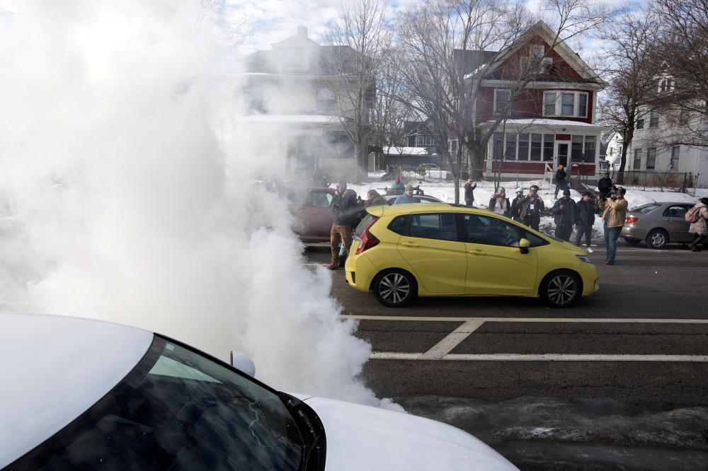 An observer’s car speeds away as they pursue US Immigration and Customs Enforcement (ICE) agents, following an incident where a civilian’s car was hit by ICE agents, after an ICE agent fatally shot Renee Nicole Good, in Minneapolis, Minnesota January 12, 2026. — Reuters pic
