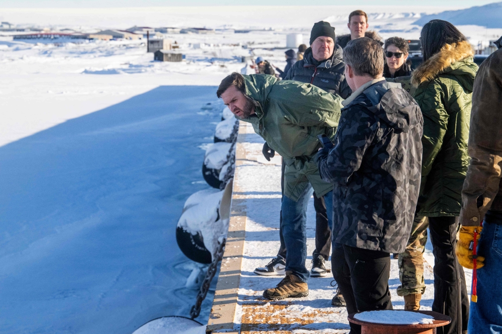 US Vice President JD Vance (left) tours the US military's Pituffik Space Base in Greenland on March 28, 2025. — Jim Watson/Pool/AFP pic 