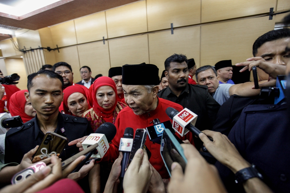 Umno president Datuk Seri Ahmad Zahid Hamidi speaks to the press during 2025 Umno General Assembly at World Trade Centre in Kuala Lumpur January 16, 2026. — Picture by Sayuti Zainudin