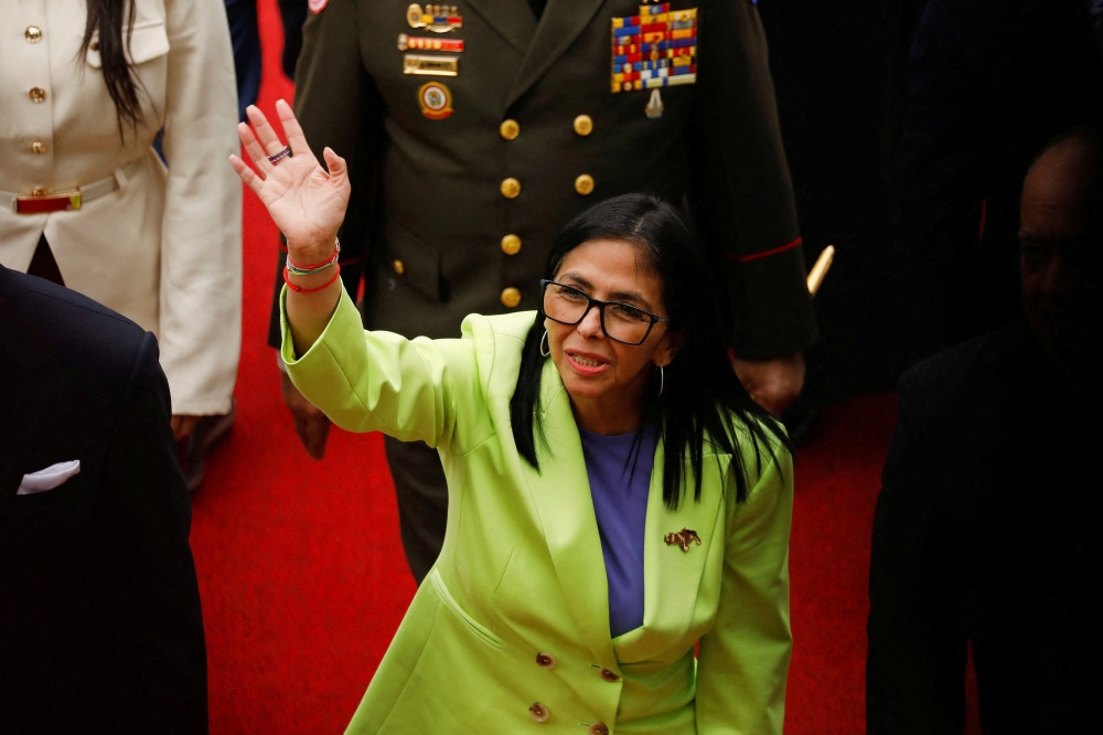 Venezuela's interim president Delcy Rodriguez waves as she walks to deliver her first annual address to the nation at the National Assembly, following the US strike in Caracas that resulted in the capture of President Nicolas Maduro and his wife, Cilia Flores, in Caracas January 15, 2026. — Reuters pic