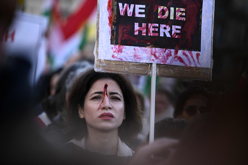 Iran’s supreme leader vows to ‘break the back of seditionists’ as groups warn thousands killed in brutal crackdown