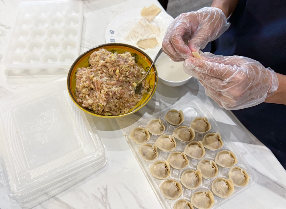 Dumplings made fresh every day and folded differently here — Picture by Lee Khang Yi