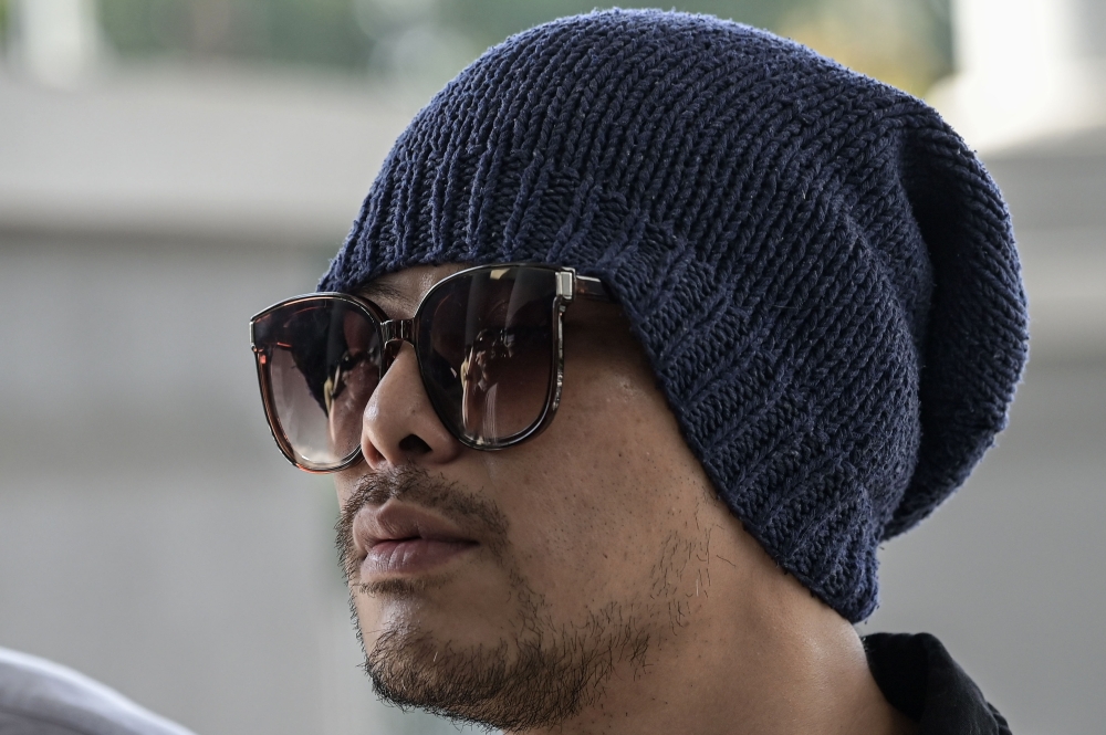 Rapper Namewee appeared before the magistrate’s court today to answer two separate charges involving the possession of controlled substances. — Bernama pic