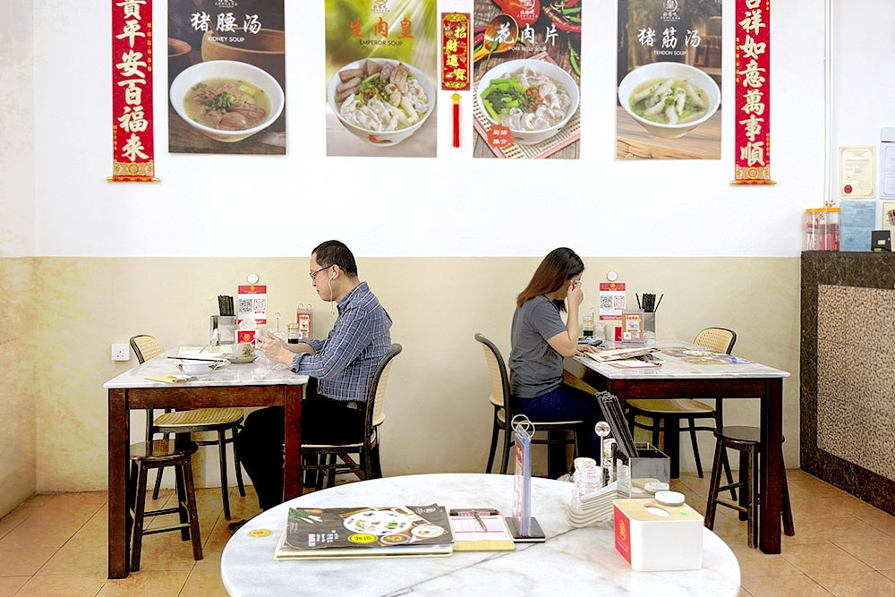 During breakfast hours, the tables are mostly occupied by office workers. — Picture by CK Lim