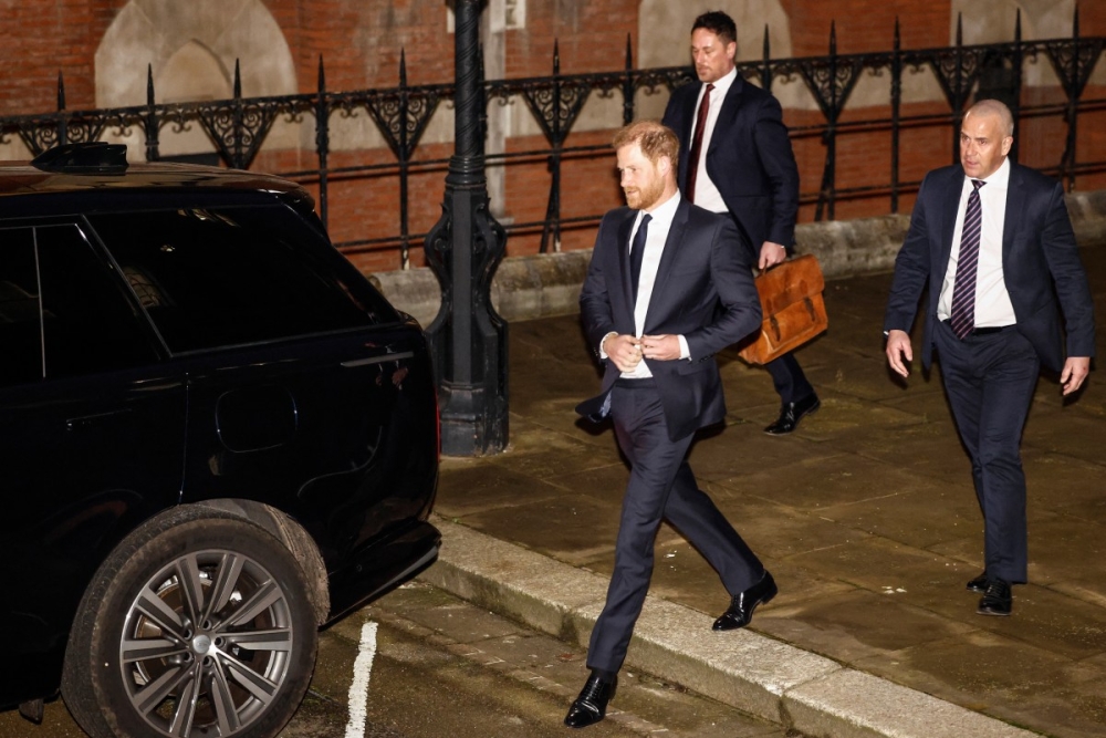 Britain’s Prince Britain’s Prince Harry, Duke of Sussex waves as he leaves the Royal Courts of Justice, Britain’s High Court, in London yesterday. — AFP pic 