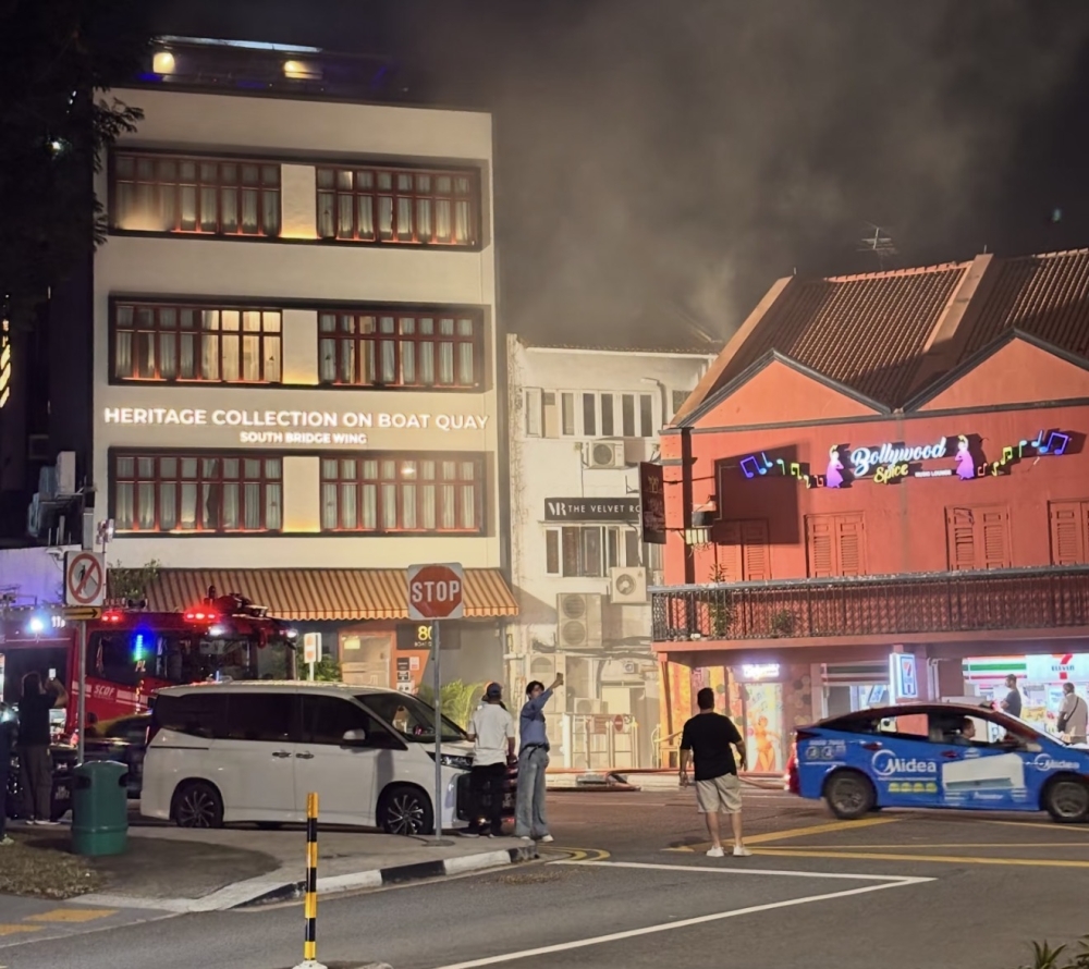 About 80 evacuated after late‑night fire at Singapore Boat Quay eatery