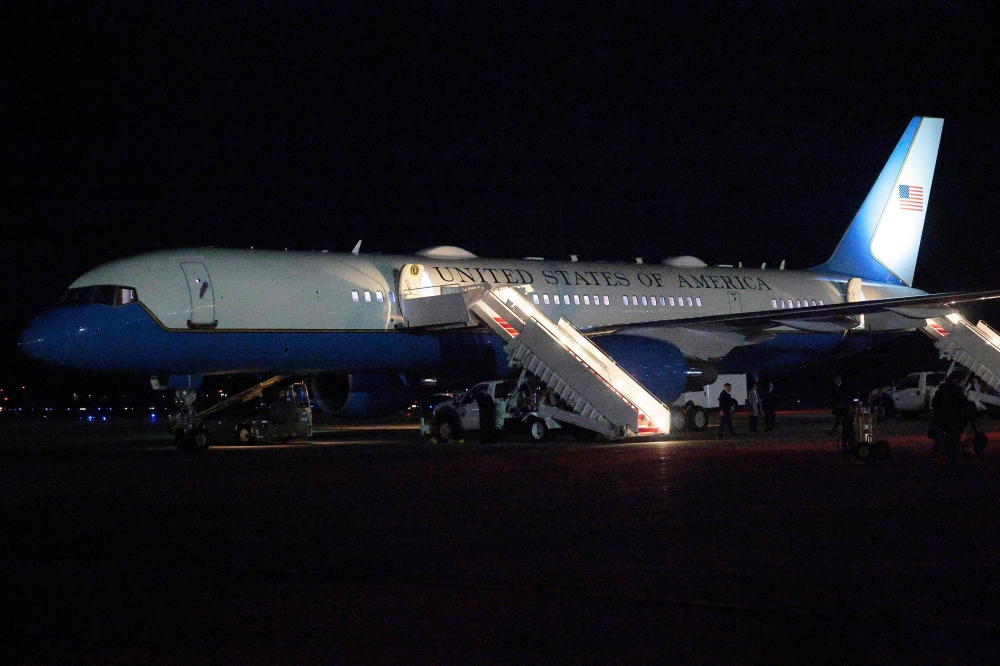 President Trump prepares to board a second Air Force One after a midair electrical glitch forced the plane to U-turn back to the US on January 20, 2026. — Getty Images via AFP 