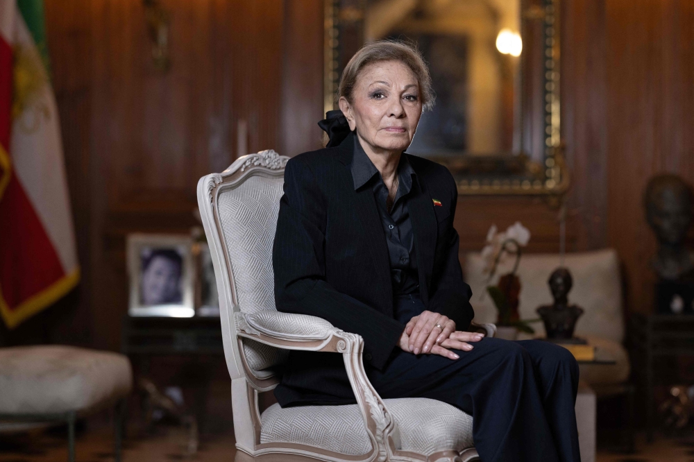 The widow of Iran’s former shah, Farah Pahlavi, poses during a photo session at her home in Paris January 20, 2026. — AFP pic