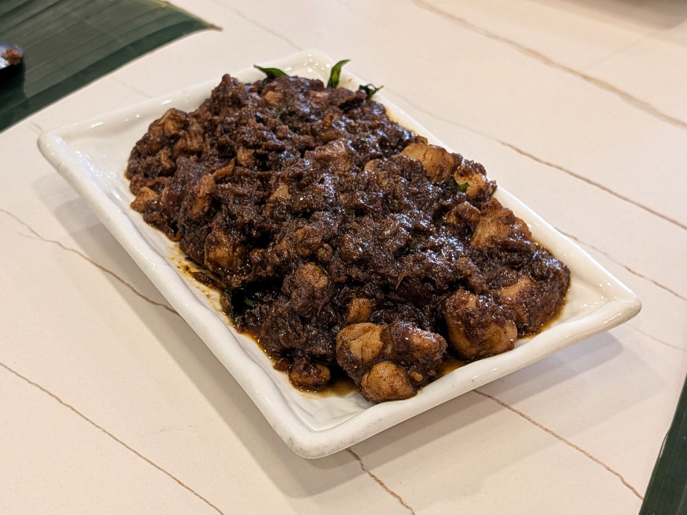 It doesn’t look like much, but the Travancore ‘kozhi perattu’ bursts with the flavour of black pepper.