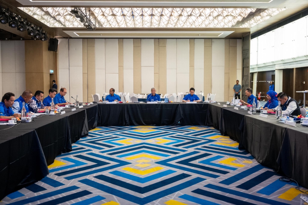 Ahmad Zahid and other leaders at the supreme council meeting. — Picture via Facebook/Zahid Hamidi