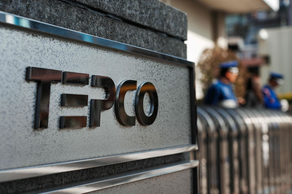 The logo of Tokyo Electric Power Company is displayed at the entrance to the company’s headquarters in Tokyo on January 19, 2026. — AFP pic