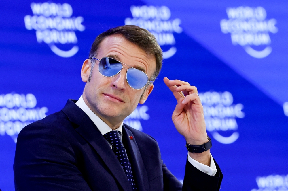 Macron’s shades steal the show in Davos — and crash a French eyewear site
