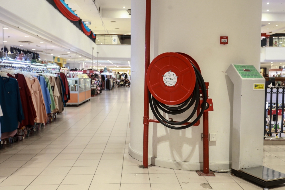 Fire hose reels are frequently vandalised, putting firefighting efforts at risk during emergencies. — Picture by Sayuti Zainudin