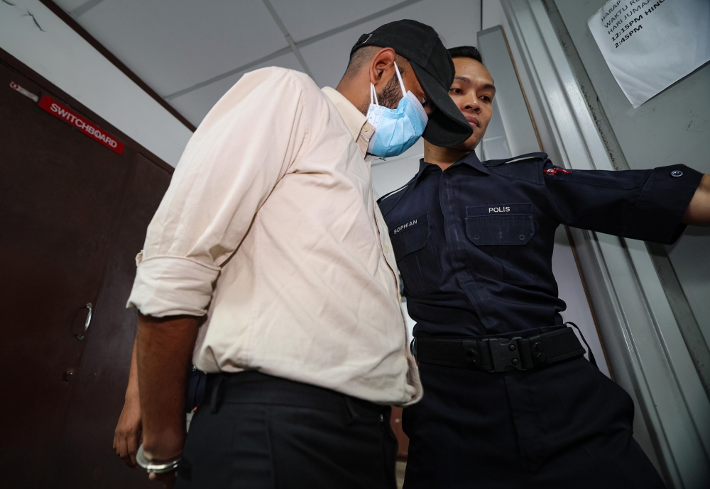 NV Vemal arrives at the Magistrate’s Court in Ipoh January 23, 2026, where he pleaded not guilty to two counts of dishonestly receiving and concealing money totalling more than RM1.4 million belonging to an Indonesian company three years ago. — Bernama pic