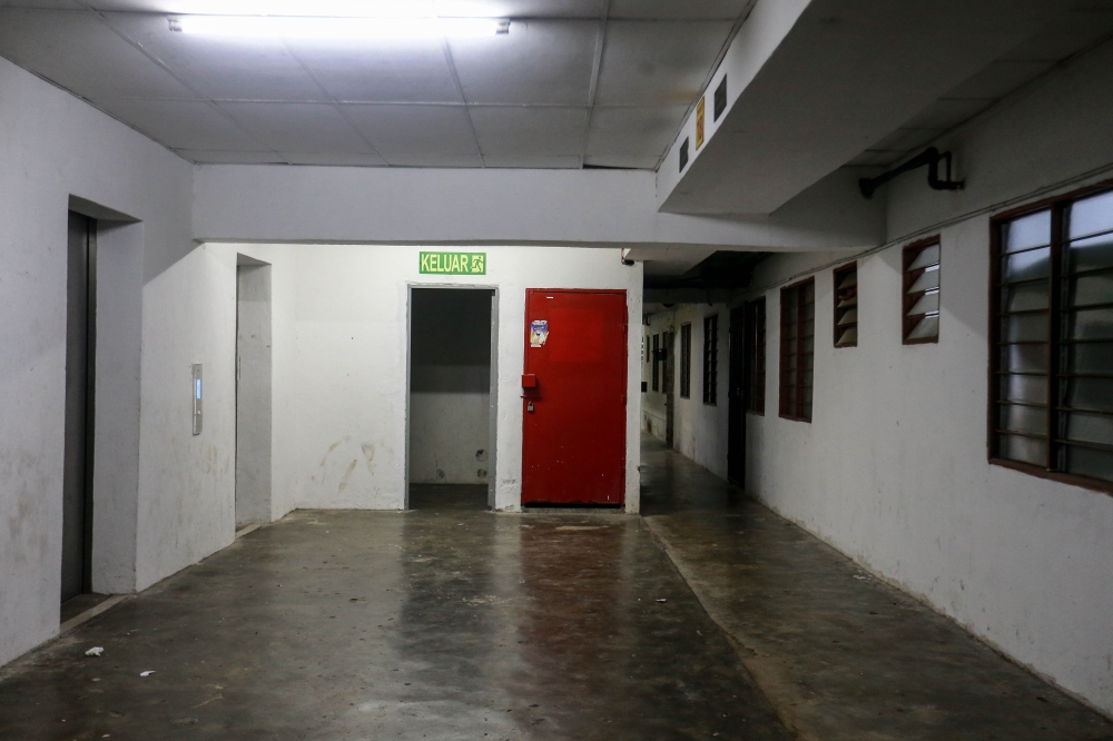A locked door at a People’s Housing Project (PPR) in Selangor, believed to store fire-fighting equipment. The door should not be locked, as restricting access can hinder emergency responders and delay their response times. — Picture by Sayuti Zainudin