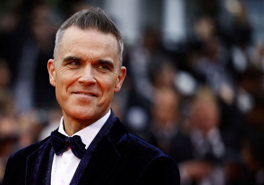 Robbie Williams tops Beatles, Rolling Stones as Britain’s chart-topping album king