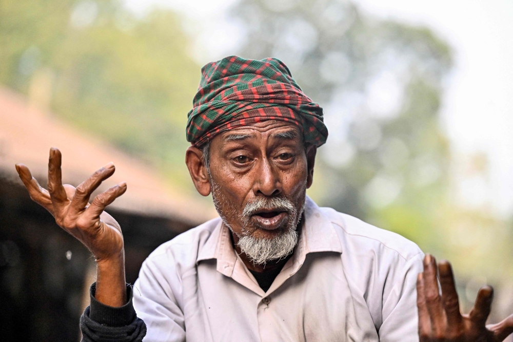 Tricycle delivery driver Mohammad Shahjahan Fakir speaks during an interview with AFP in Gopalganj, Bangladesh on January 14, 2026 about the government’s ban against the Awami League party for the February 2026 general election. — AFP pic