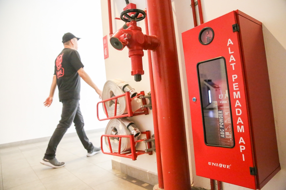 An example of a double-leaf fire-rated door can be found in shopping malls. — Picture by Sayuti Zainudin