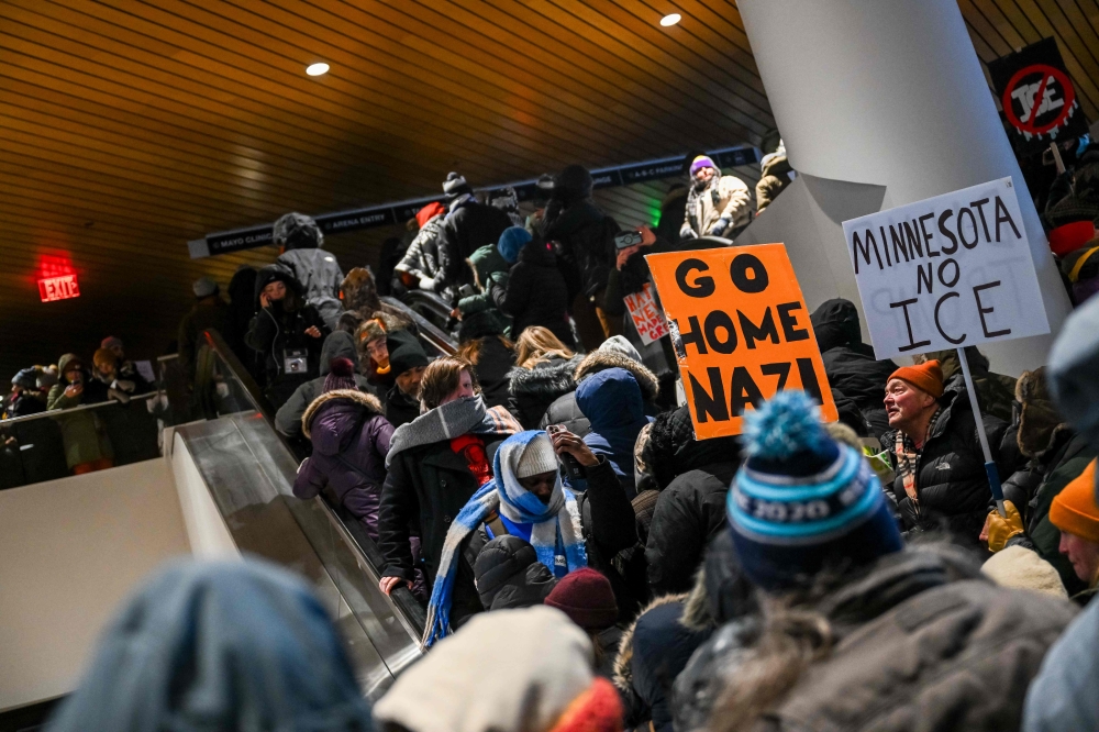Demonstrators participate in a rally and march during an ‘ICE Out’ day of protest in Minneapolis, Minnesota. — AFP pic