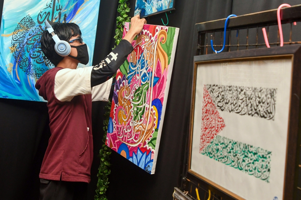 The youngest of eight siblings, he said his deep interest in khat calligraphy began during his primary school years at Sekolah Rendah Islam Al Furqan in Pasir Mas, where he first learned the subject in Year Three. — Bernama pic 