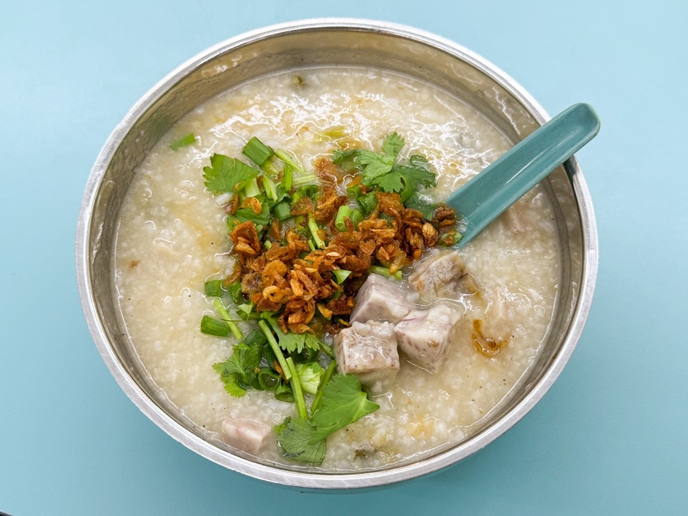 Porridge gets a makeover with chunks of taro and salted pork belly. — Picture by Lee Khang Yi
