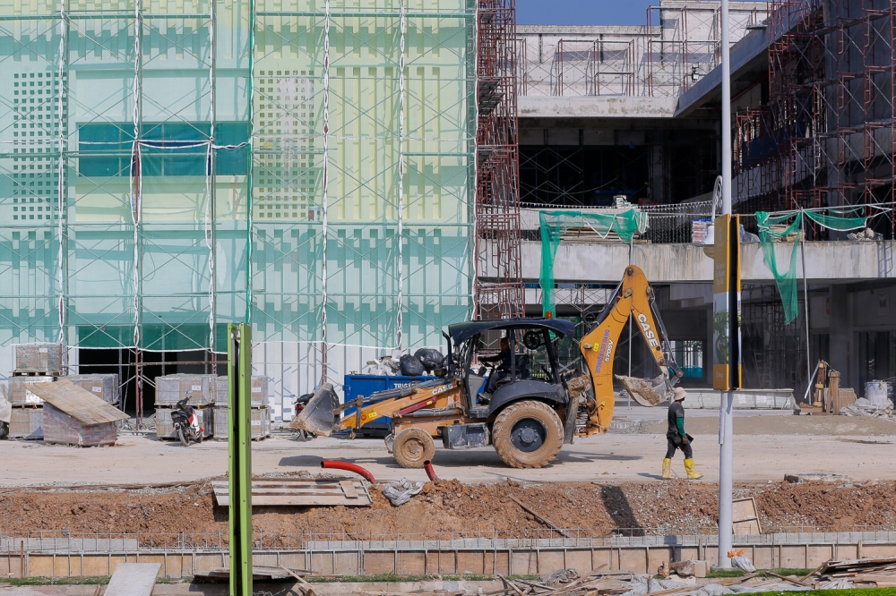 The author says that building more commercial stock does not automatically translate into stronger economic vibrancy, particularly when new supply struggles to attract tenants, shoppers, and business operators. —Picture by Raymond Manuel