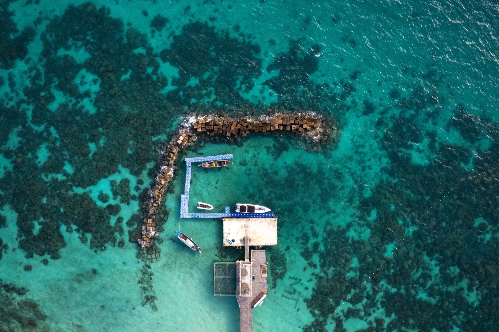 A drone view shows the pier on Maiton Island where a sea pen is installed for acclimatising juvenile Indo-Pacific leopard sharks ahead of their release into the wild, in Phuket December 6, 2025. — Reuters pic