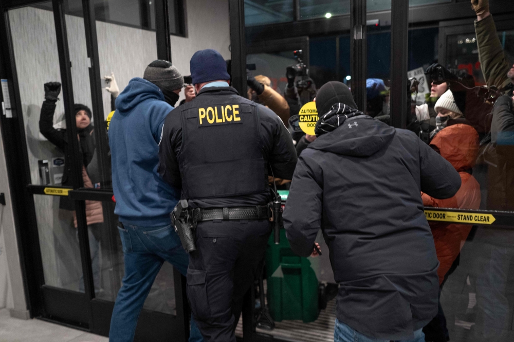 Protesters march in Minneapolis after second US citizen killed by federal immigration agents