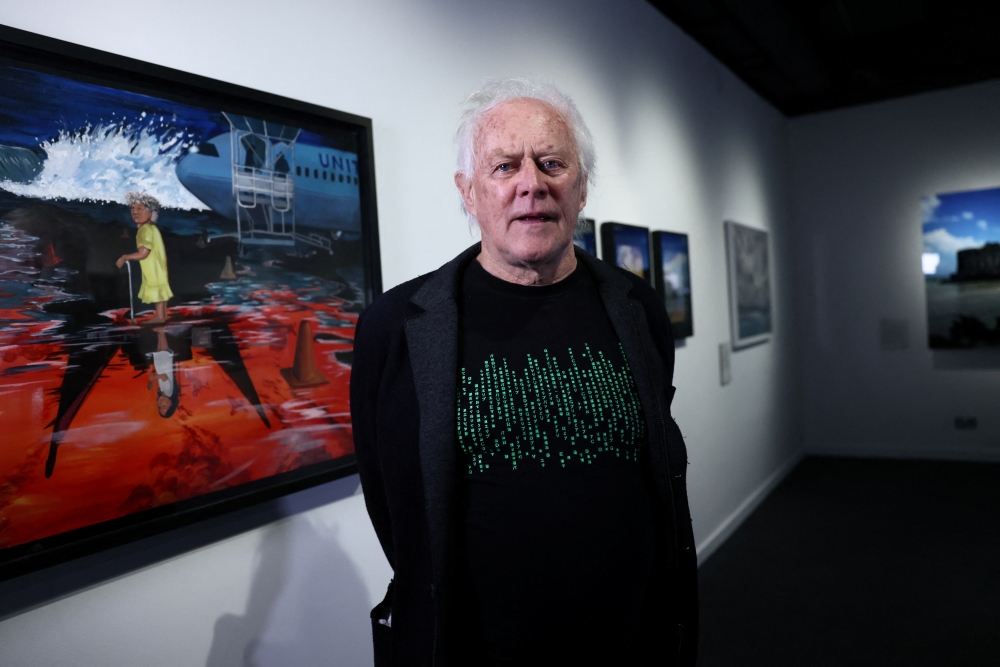 Artist and climate change activist David Buckland poses for a picture at the ‘Komij Mour Ijin/Our Life is Here’, exhibition inspired by a trip a group of artists took on the Marshall Islands in the central Pacific Ocean, at the National Maritime Museum, in London January 23, 2026. — Reuters pic