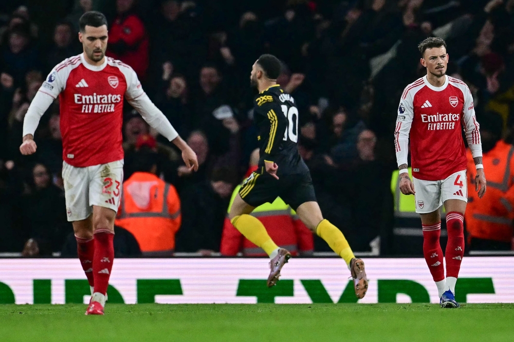 Are Arsenal bottling it again? Man United defeat reopens old wounds as Premier League race tightens