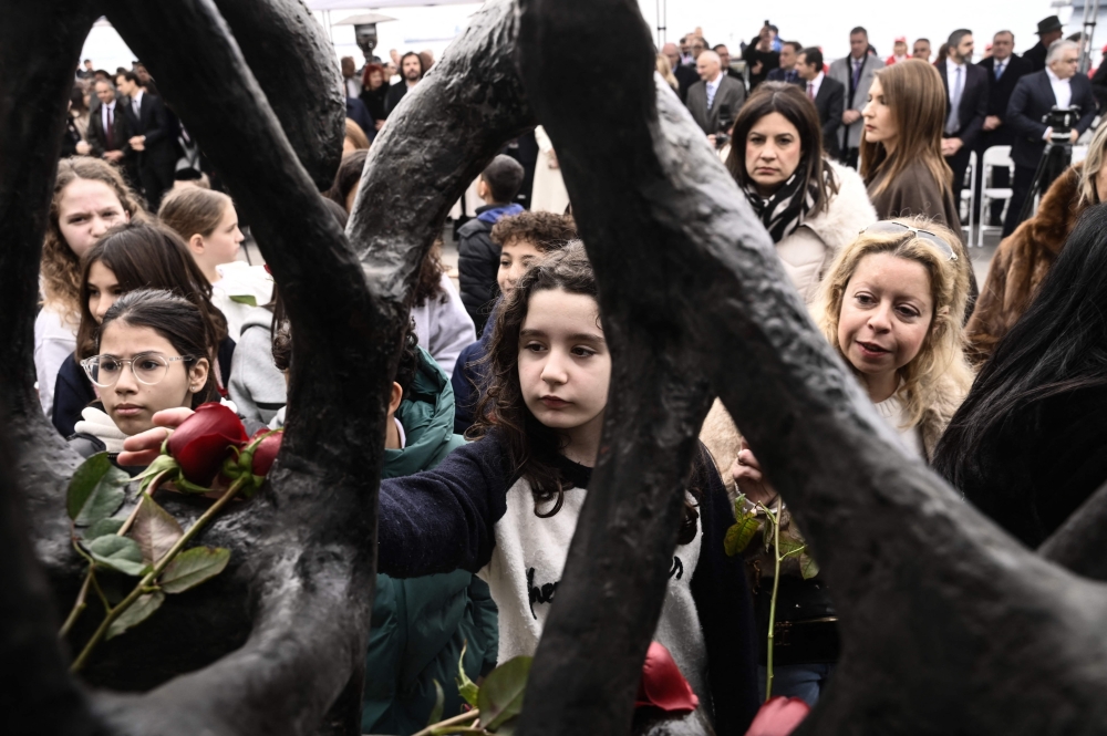 Clickbait and ‘AI slop’ are warping Holocaust history, scholars warn