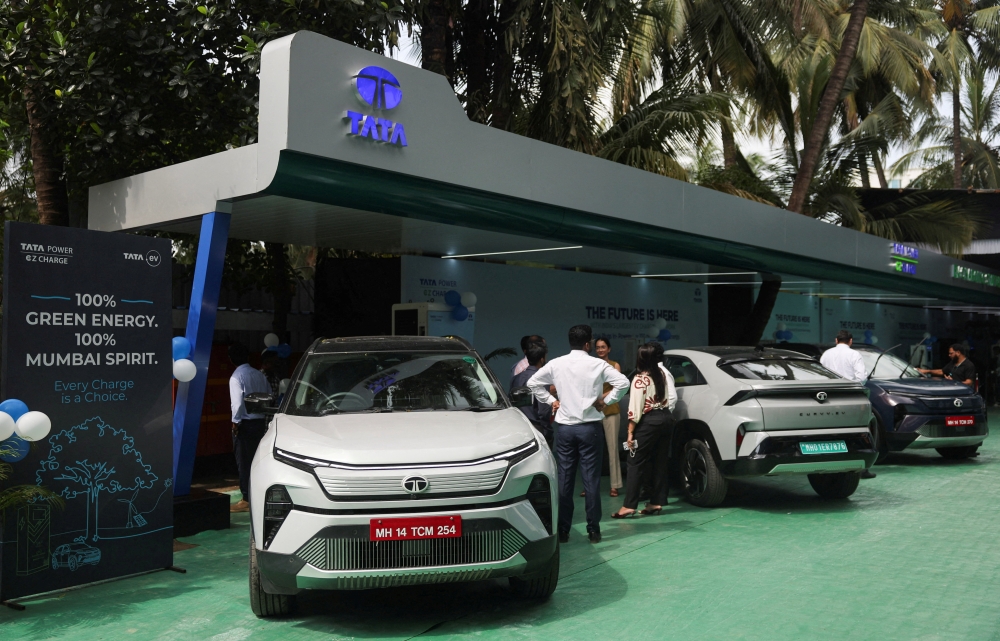 Tata electric vehicles are parked as they recharge at a Tata EV charging station in Mumbai September 9, 2025. — Reuters pic  
