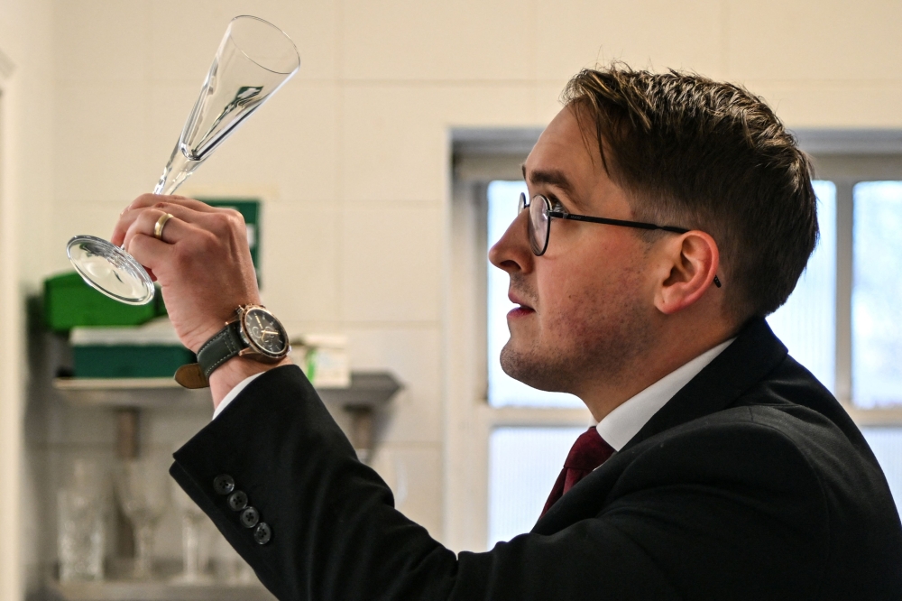 This photo taken on January 16, 2026 shows head butler Stuart Banks working at Dumfries House, headquarters of the King's Foundation near Cumnock, south of Glasgow, Scotland. — AFP pic