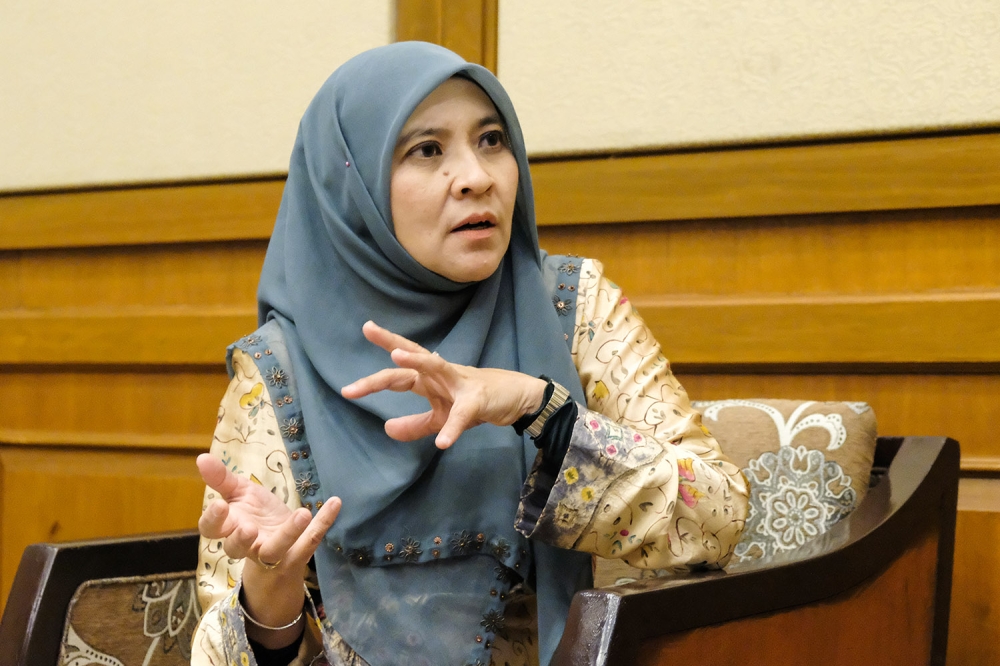 Suhakam Children's Commissioner Dr Farah Nini Dasuki speaks during a special interview in Kuala Lumpur on December 12, 2023. — Picture by Miera Zulyana