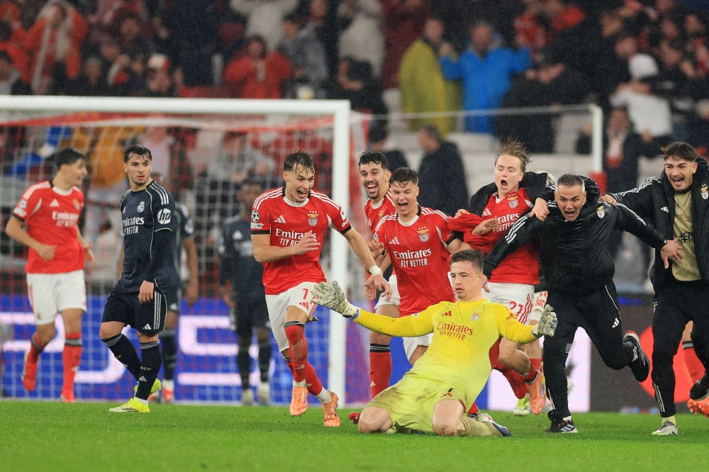 Benfica book last-16 spot and condemn Real Madrid to play-offs with dramatic keeper strike
