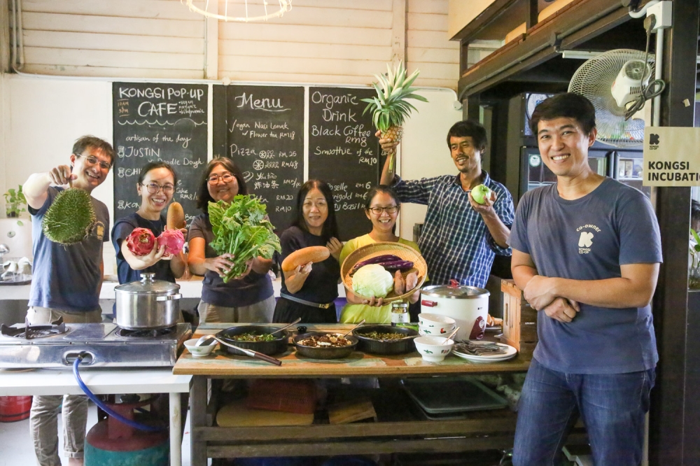 Co-founder Chong Siu Hou (right) pictured with fellow co-partners at Kongsi Co-op. — Picture by Choo Choy May