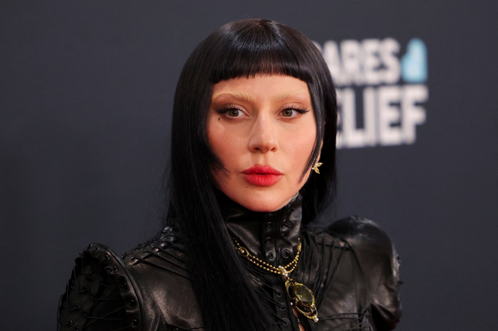 Lady Gaga pauses Tokyo concert to rally support for Americans ‘mercilessly targeted’ by ICE