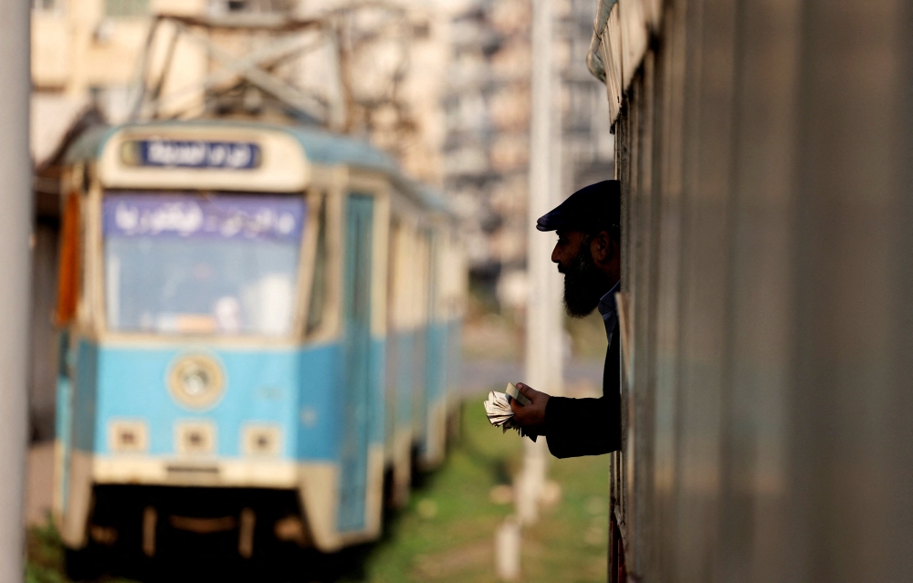 Alexandria’s century-old trams rattle to a halt as Egypt pushes sleek light rail into the city’s heart