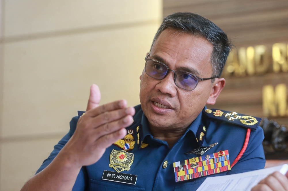 Bomba director-general Datuk Seri Nor Hisham Mohamad said for the time being, its officers will be asked to decide whether to deploy fire engines or to send assessment officers first as part of measures to reduce the number of fake emergency calls. — Picture by Sayuti Zainudin