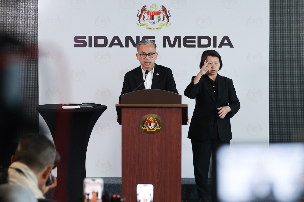 Minister of Communications and Unity Government spokesman Datuk Fahmi Fadzil speaks during his weekly press conference at Menara Komunikasi in Putrajaya on January 30, 2026. — Bernama pic