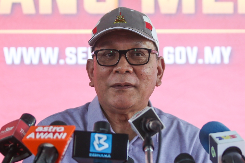 State Infrastructure and Agriculture Exco, Datuk Izham Hashim, said that the move is part of a state policy to ensure pig farm management is conducted in a more organised and sustainable manner, in line with public health and environmental standards. — Picture by Yusof Mat Isa