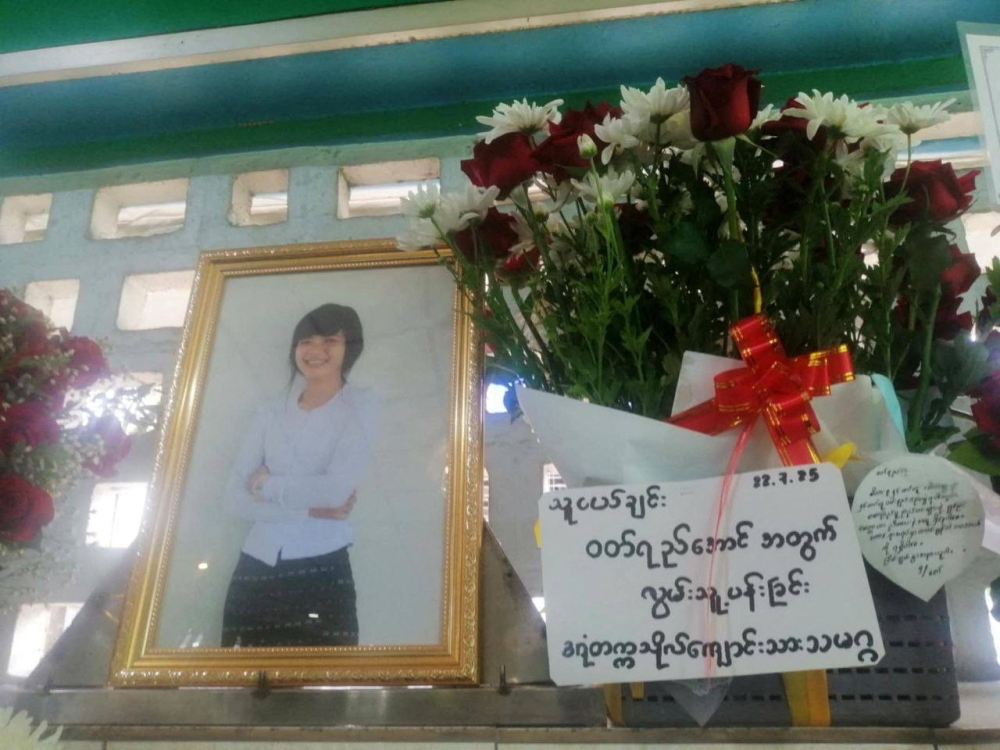 A photo of Wutt Yee Aung, the Myanmar student protester who died in prison in July 2025, placed beside flowers at her funeral in an undisclosed location in Myanmar, in this handout image released on July 22, 2025. — Reuters pic/Dagon University Students’ Union handout