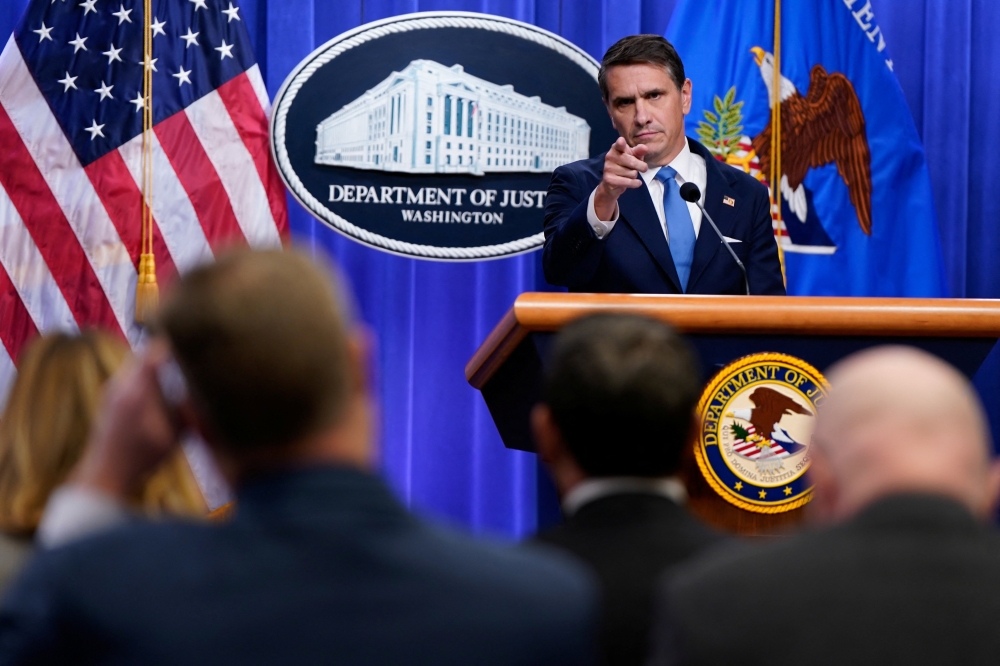 Deputy US Attorney General Todd Blanche calls on a reporter during a press conference at the Justice Department in Washington, D.C. January 30, 2026. — Reuters pic