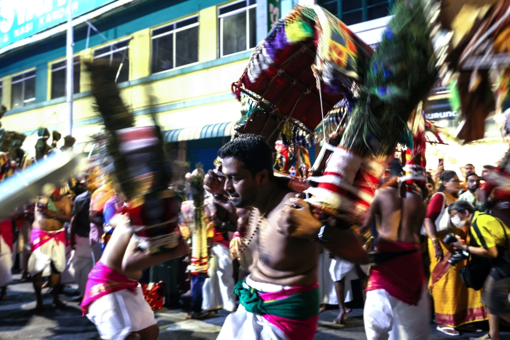 Hindu devotees carry ‘kavadi’ as an act of fulfilment of vows during the Silver Chariot procession in George Town January 31, 2026. — Bernama pic