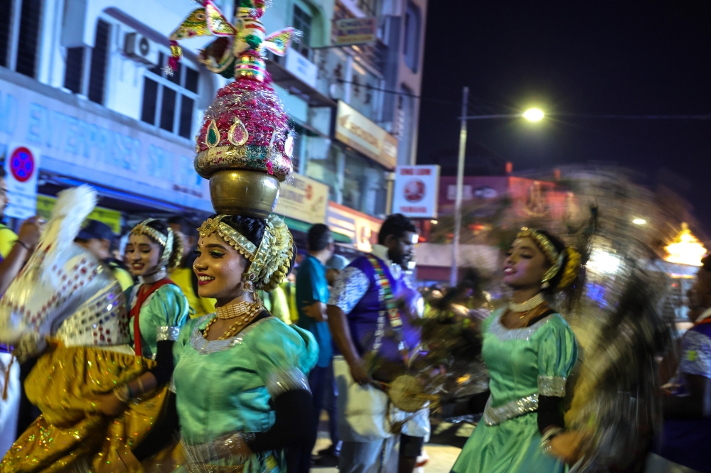 Hindu devotees participate in the chariot procession along Lebuh Chulia in George Town January 31, 2026. — Bernama pic