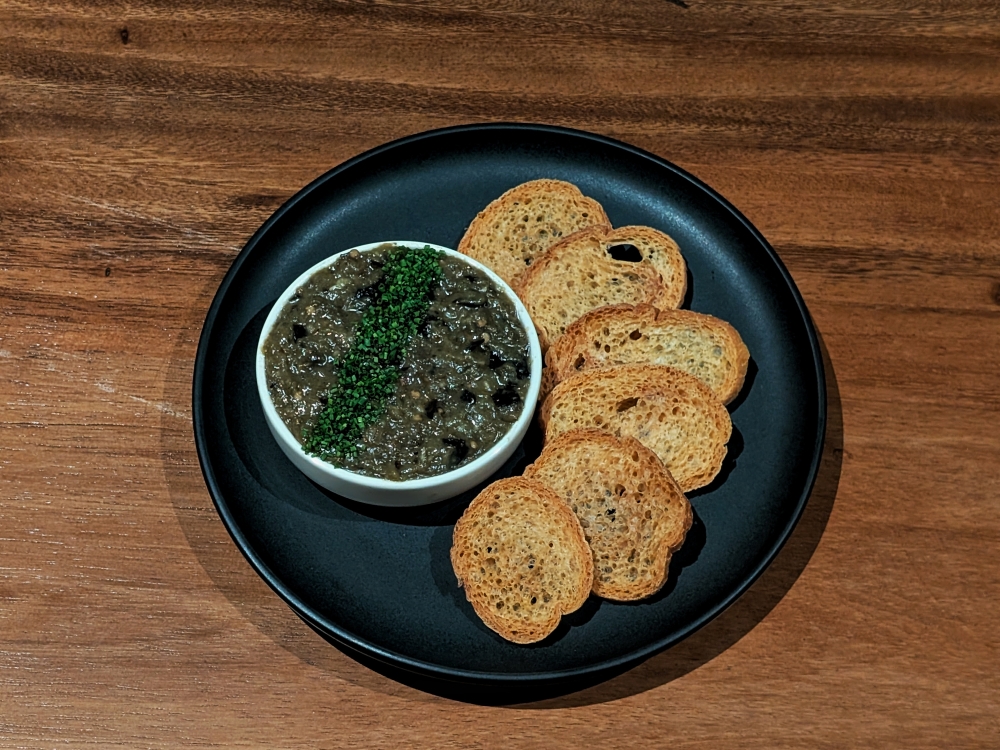 A great ‘pâté’ of century egg, eggplant and Chinese screw peppers. — Picture by Ethan Lau 