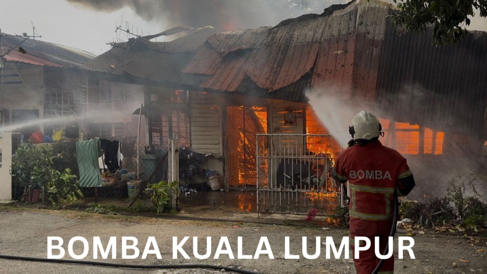 A disabled man suffered burns on his leg in a fire involving seven houses in Jinjang, Kepong here yesterday. — Picture via Facebook/Bomba Kuala Lumpur